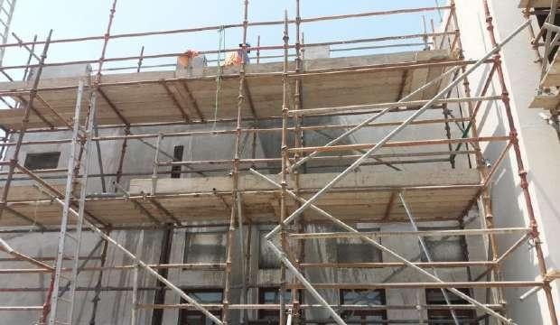 Scaffold access erected around a building work area